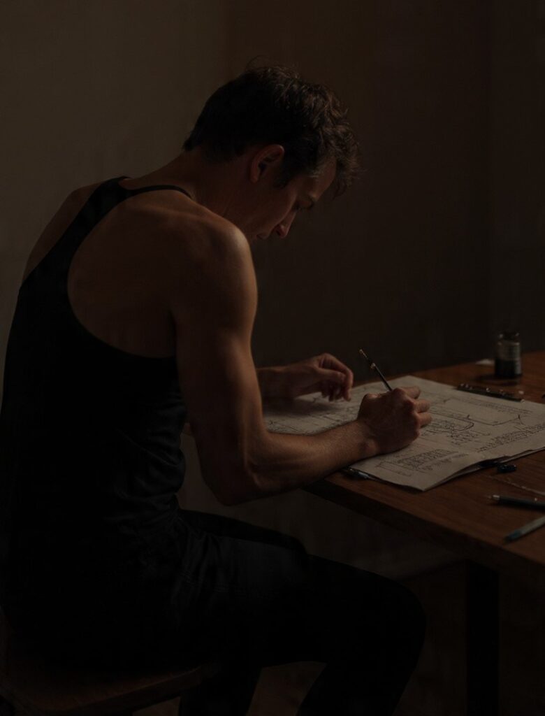 A person practicing their craft alone in soft light, symbolizing the discipline, focus, and steady progress that come from deliberate practice.