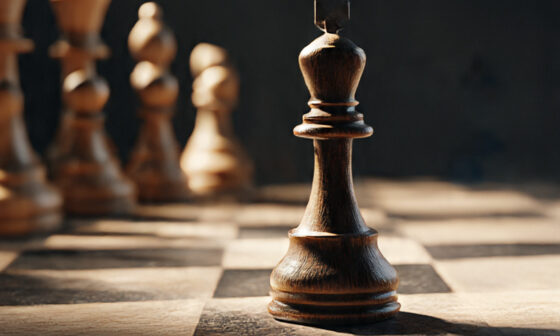 Chessboard showing a small captured piece while the overall position is lost, symbolizing short-term victory at the cost of long-term success.