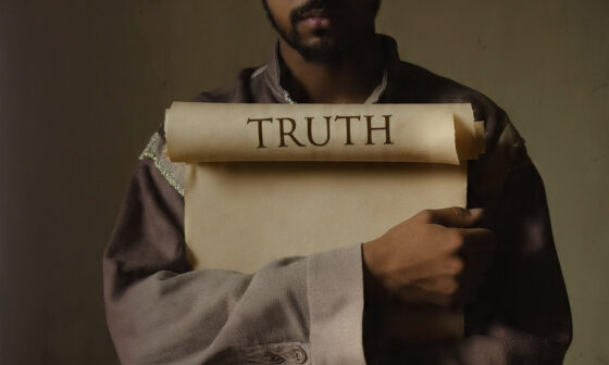 A person choosing to hold onto truth instead of trading it for money, symbolizing “Buy the truth and do not sell it”