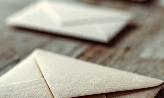 A quiet, dimly lit room with a single chair near a window, sheer curtains gently diffusing light. The atmosphere is still and contemplative, symbolizing restraint, discretion, and moral choice. Muted colors, soft shadows, minimalist composition, editorial photography style, no text, no faces.