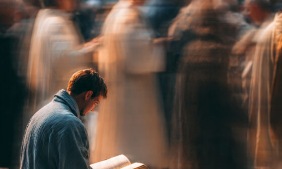 person reading the Bible and choosing God’s Word over religious traditions