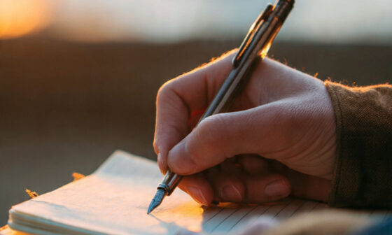 person standing at a crossroads deciding between delaying change and taking action now