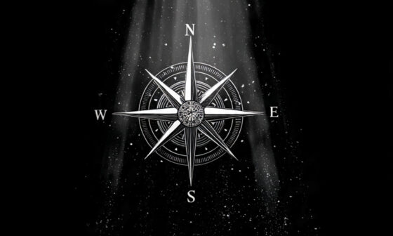 Symbolic representation of a compass pointing toward light in a dark environment.
